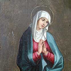 Le panneau de la Vierge avant restauration puis après intervention